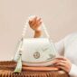 Embroidery_Leather_Vintage_White_Lotus_Handbag_with_Pendant_-_SinoCultural-2476532.jpg