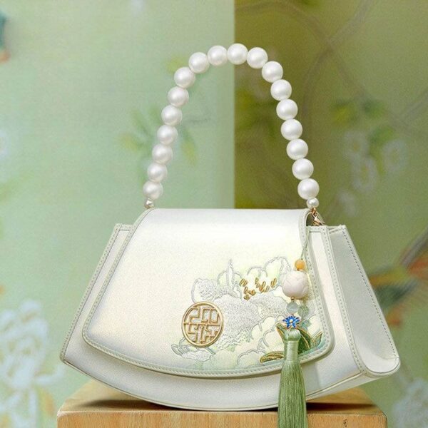 Embroidery_Leather_Vintage_White_Lotus_Handbag_with_Pendant_-_SinoCultural-2476550.jpg