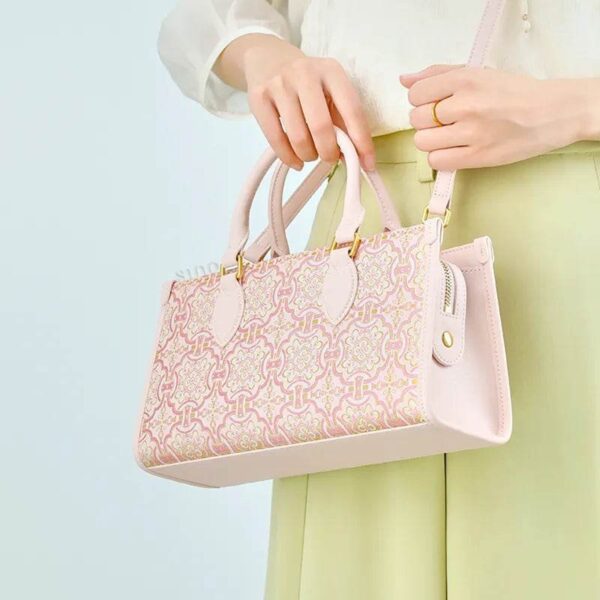 song-brocade-leather-handbag-pink-gold-dingsheng-motif-model-crossbody.jpg
