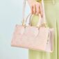 song-brocade-leather-handbag-pink-gold-dingsheng-motif-model-shoulder-handheld.jpg
